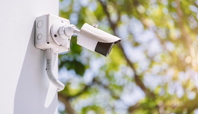 A security camera mounted on the wall